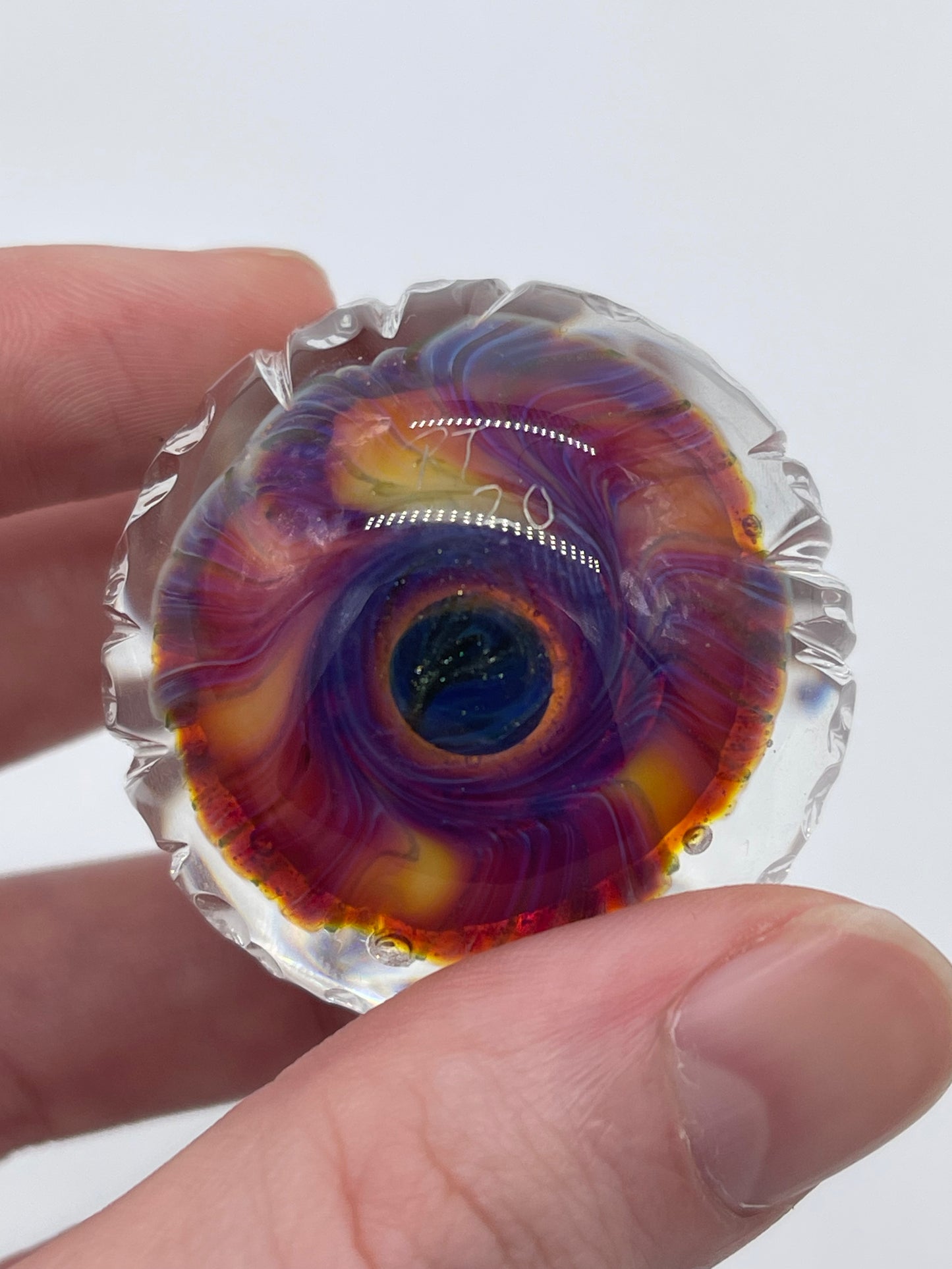 The eye can see you on this side of the marble