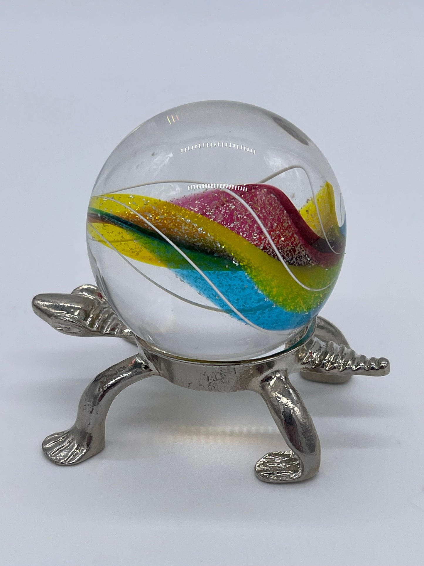 Ron Thomas Clear Swirl Marble comes with seen turtle stand