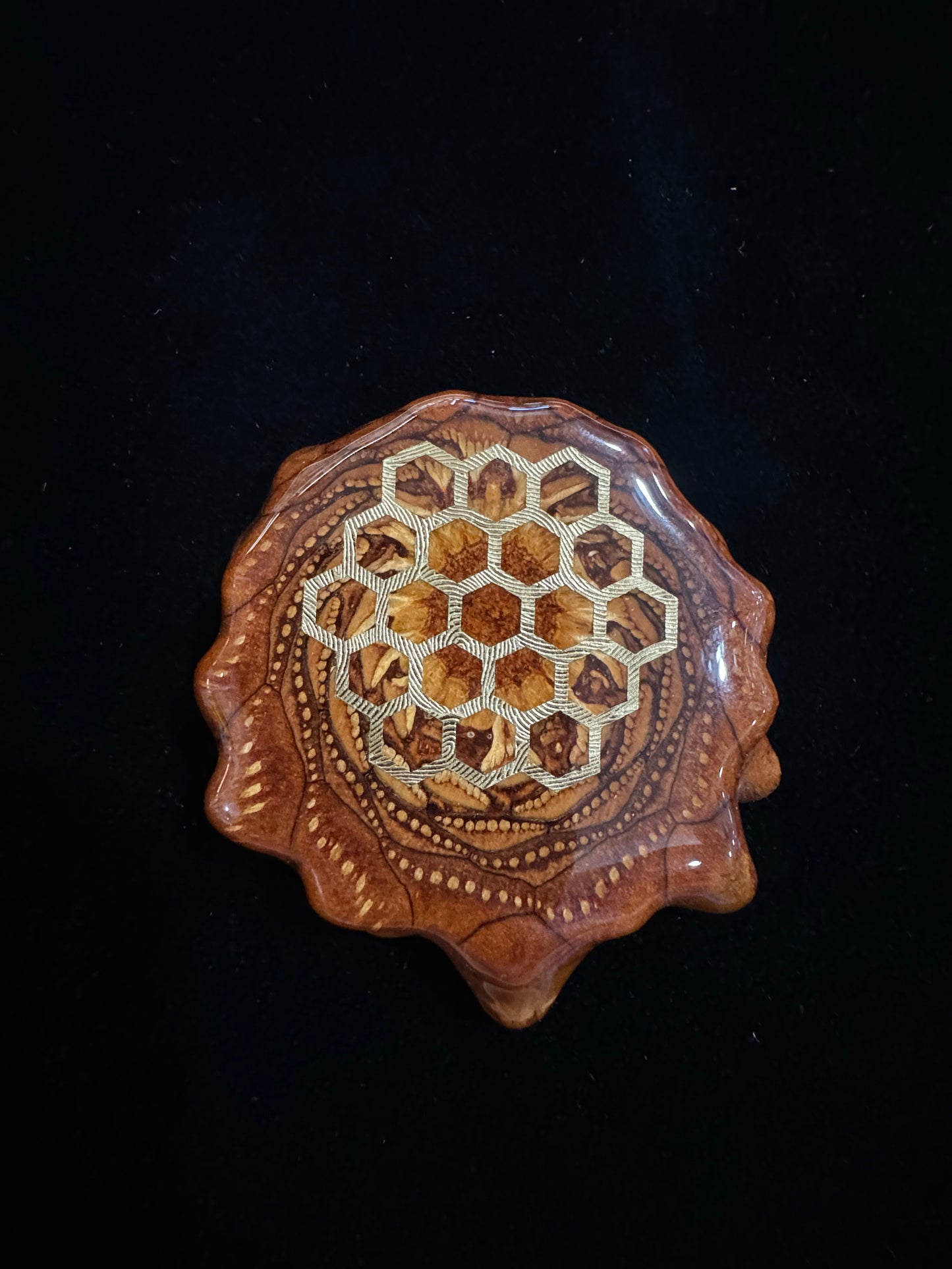 American pendant features a stunning third eye Pinecone made from natural materials.
