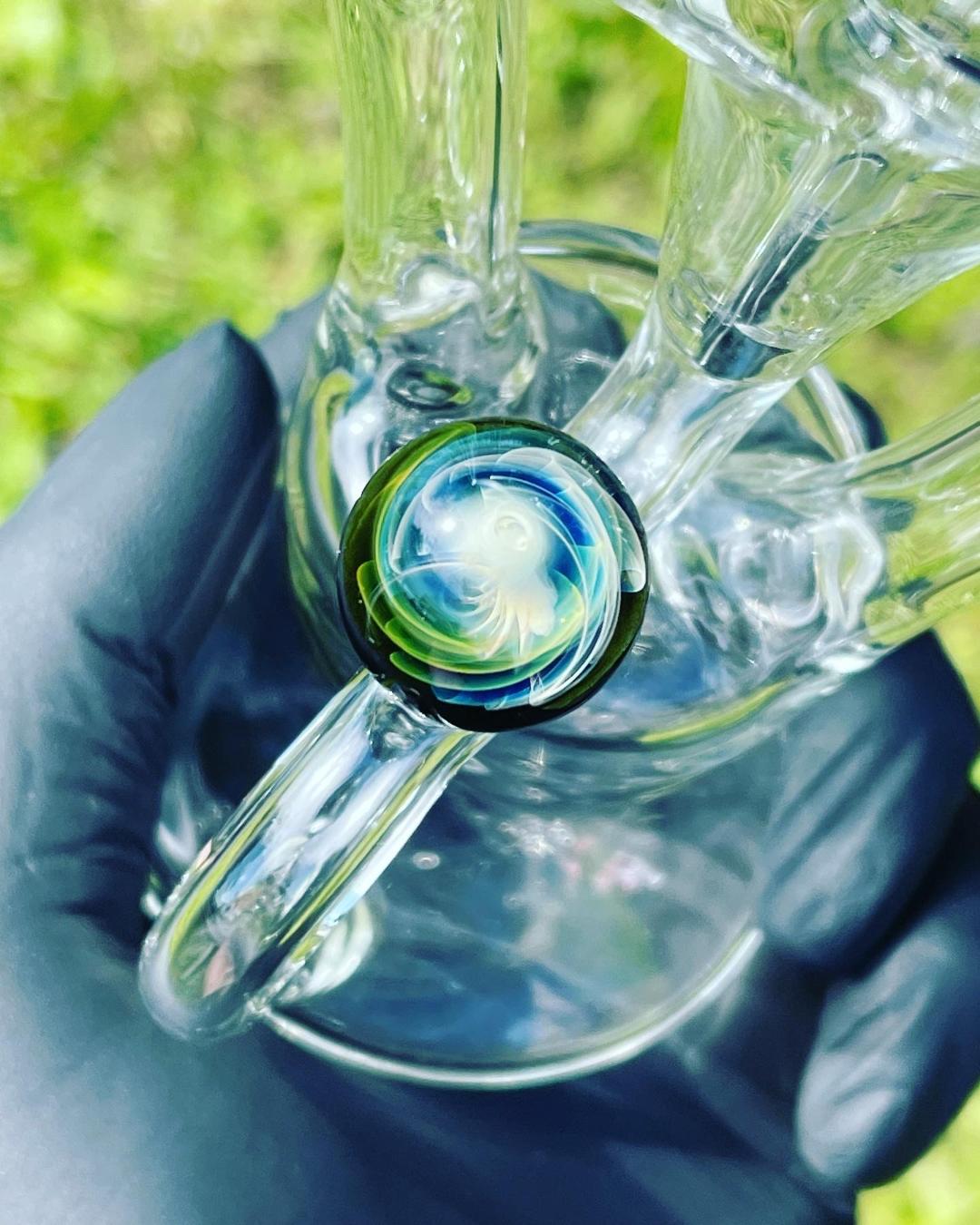Highlighting the opal on this heady piece