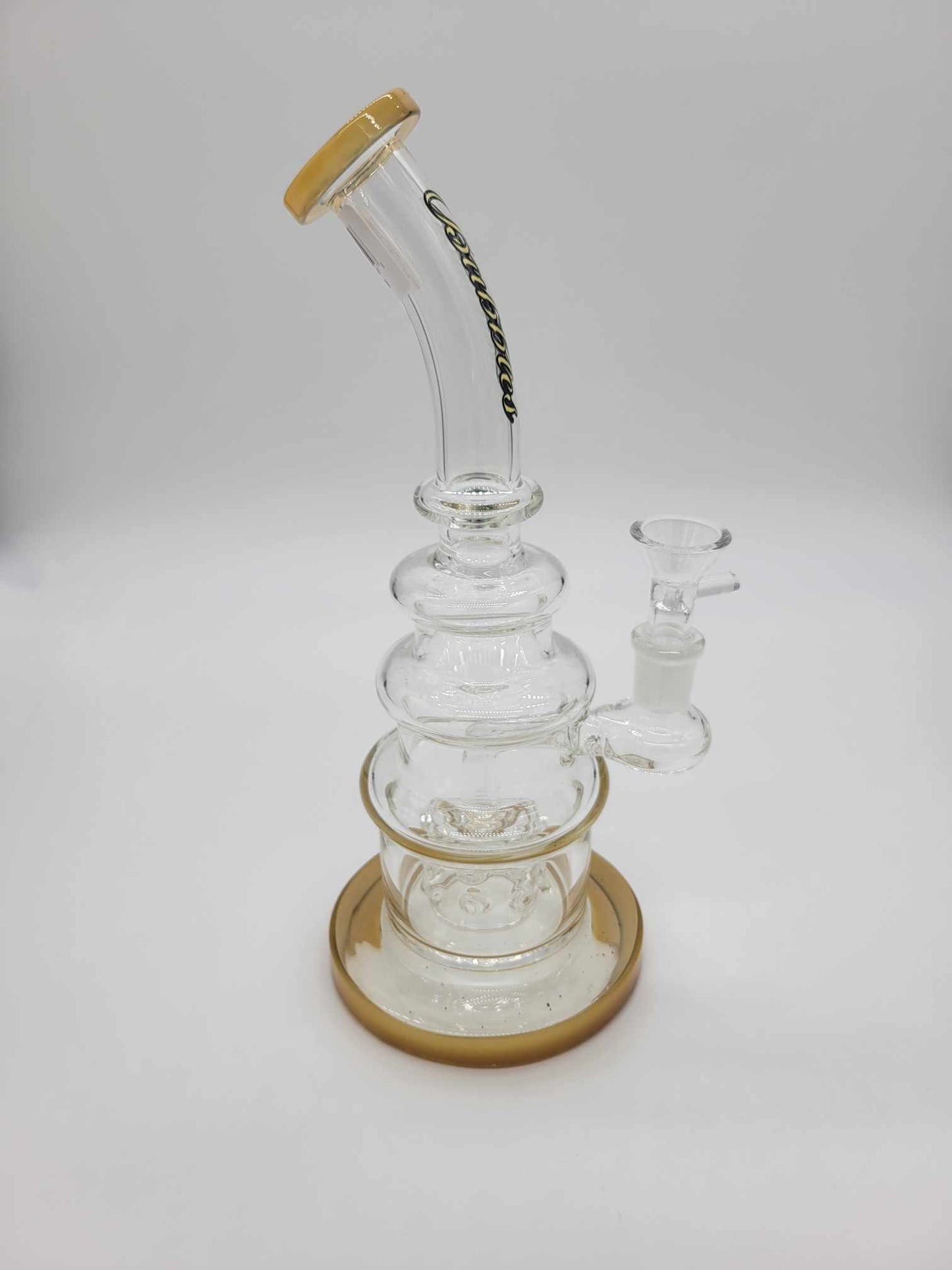 Side view Bubbler waterpipe with gold accents and 14mm slide/bowl