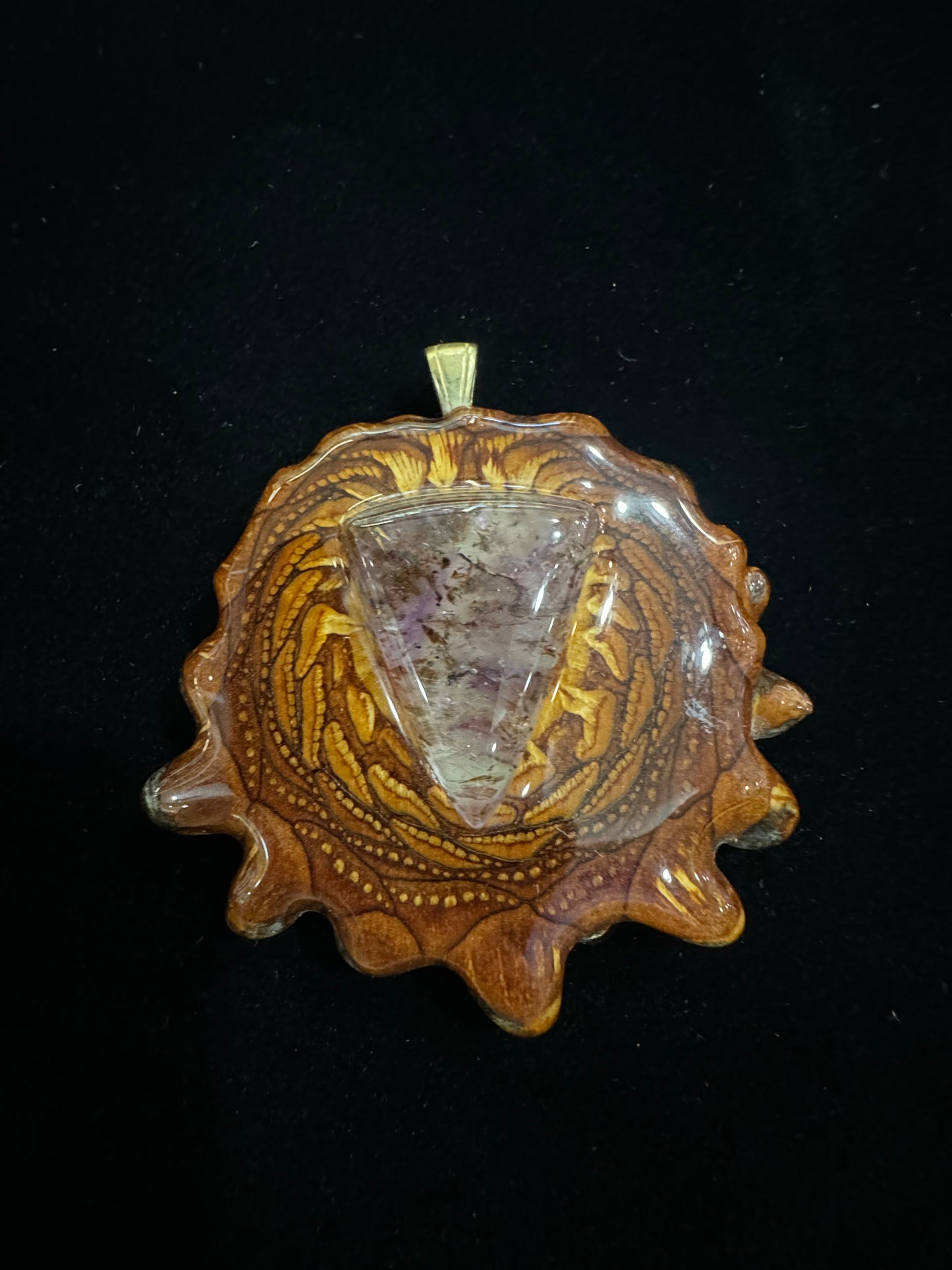 lowing Super Seven stone, believed to enhance intuition and spiritual growth.